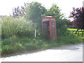 ST8115 : Manston: a rather forlorn phone box by Chris Downer