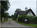 Thatched gate lodge at Hemingford Park