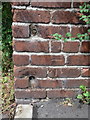 Bench mark in Brook Street, Mold