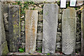 NM7701 : Grave slabs, The Old Chapel, Craignish by Stuart Wilding