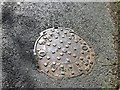 SO5906 : Manhole cover made locally by Alex McGregor