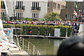 View of the crowd and the prize winners on the opposite side of the dock