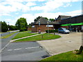 Looking east on Maple Drive past the "Co-op"