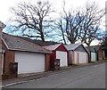 Lockup garages and bare trees, Conway Road, Cwmparc