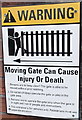 Moving gate warning notice in Kyveilog Street, Cardiff