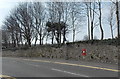 King George V postbox in a long wall, Bridgend