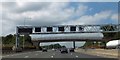 TL1002 : Gantry and bridleway bridge over M25  by David Smith