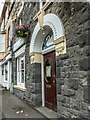 SO0450 : Swan Plasterwork above Door, Builth Wells, Powys by Christine Matthews