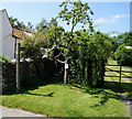 Stile and finger post at Village Farm, Saxton