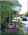 Flowers and Ratby sign along Groby Road