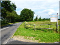 Looking eastwards on the A324 from Henley Park Farm