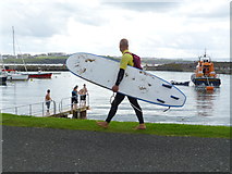 C8540 : Man with surfboard, Portrush by Kenneth  Allen