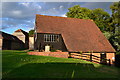 Coultershaw Heritage Site with farm buildings beyond