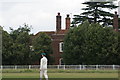 View of a large house in Matching Green from the green