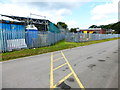 Footpath through business park heads for the fields