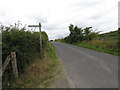 View WNW along Legananny Road from its junction with the Windy Gap Pad