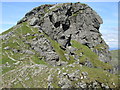 NN2605 : Figures on the skyline of the north top of �The Cobbler� by Peter S