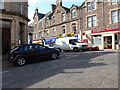 Car turning from Church Street into the High Street