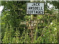 TM2989 : Jack Asdell Cottages & High Green Farm signs by Geographer