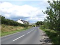 Houses alongside the Dromara Road