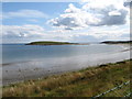 View south across the strand to Ballyhornan Bay and Guns Island