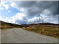 NN9243 : Wind farm road by Richard Webb