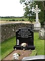 The grave of Ellen Hudson and a memorial to her husband Pte Eric Hudson at St Joseph