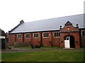 Historic indoor riding school at The Durdans stables