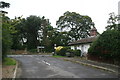 Cottage and estate gateposts, end of School Lane, Brattleby