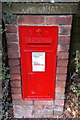 King Edward VII postbox  in an Alderley Road hedge in Wilmslow