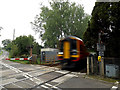 TG1904 : Train at Intwood Road Crossing by Geographer