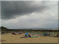 On the beach, under a cloud, at Constantine Bay