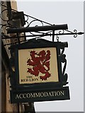 SP1439 : The Red Lion sign by Oast House Archive