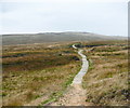 SD9714 : The start of the paving on the Pennine Way by Humphrey Bolton