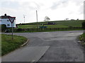 NY2951 : Junction of Shaw Wood Lane with A596 at Shaw Rigg by Peter Wood