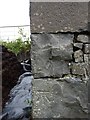 Cut benchmark on outbuildings at Seafield, Bowmore, Islay