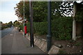 Old and new street lamps and a pillar box, Holt Road, Sheringham