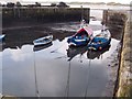 NU2328 : Low tide, Beadnell harbour by David Chatterton