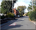 Triangular sign painted on the road surface, Wem