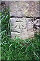 Benchmark on barn at Mile House Farm