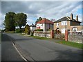 NY2549 : Houses on the north side of Cross Lane, Wigton by Christine Johnstone