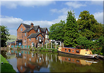 SJ8934 : Canal, school and narrowboat at Stone, Staffordshire by Roger  D Kidd