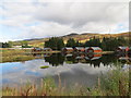 Chalets around the man made loch at Glengoulandie