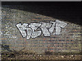 SP0974 : Graffiti under a railway bridge by Robin Stott