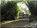 Holmbury:  Gated entrance to 