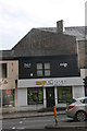 Ghost sign above shops on Eccelsall Road