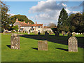 TF8115 : Churchyard in Castle Acre by Trevor Littlewood