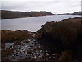 NH1999 : Tiny inlet to Lochanan nan Sailean Mora above Langwell, Ullapool by ian shiell