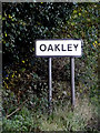 Oakley Village Name sign on the B1118