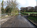 NY5254 : Flooded road at Tarn Lodge by Oliver Dixon